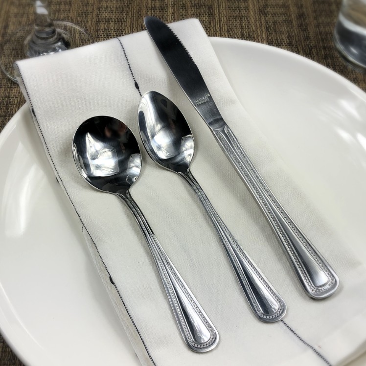 KNIFE, DINNER PEBBLES S/S WAVY EDGE